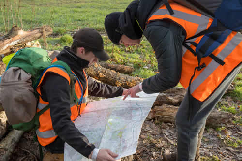 Winter survival team navigating
